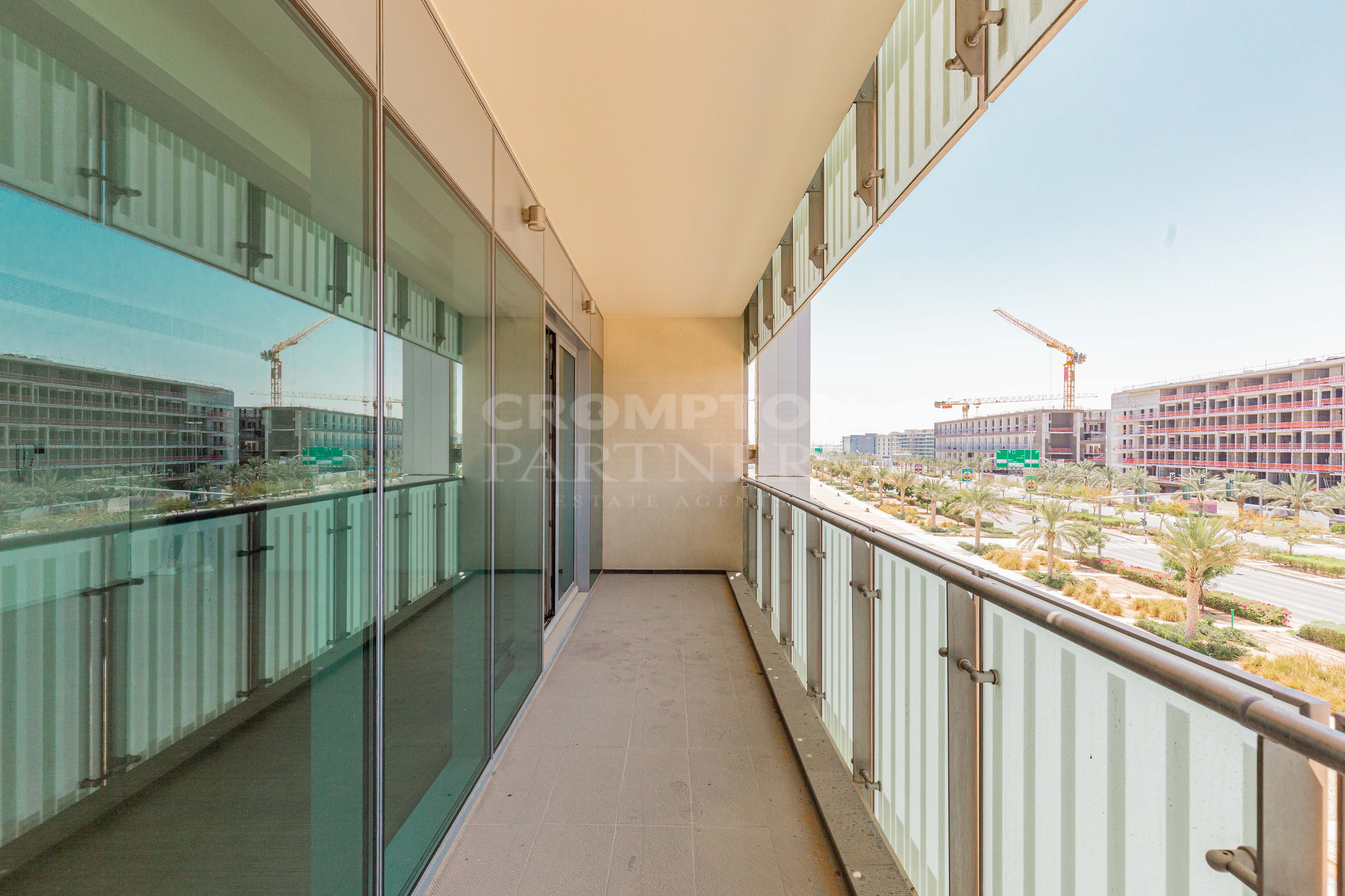 Spacious 3BR+Maid | Corner Unit | Community View - Photo 2